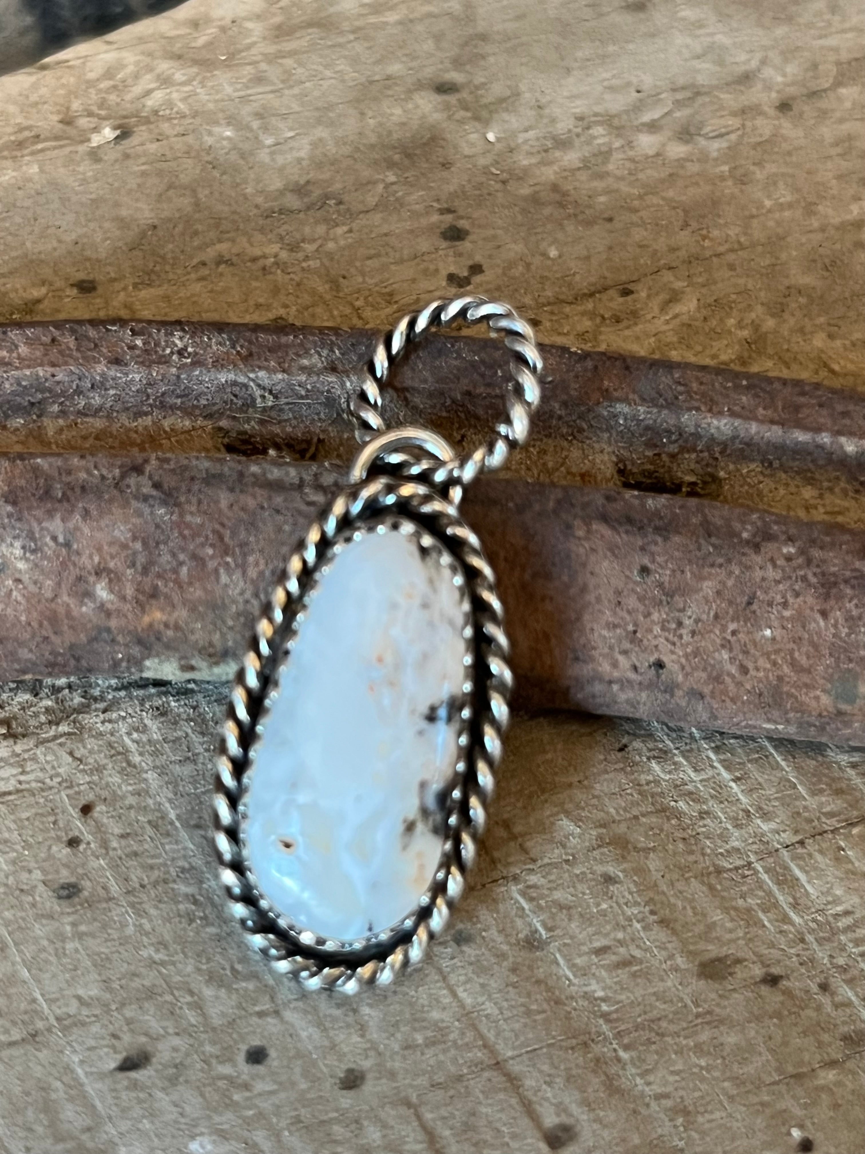 Hand crafted white buffalo sterling silver pendanat